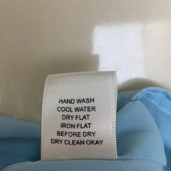 SOLD Not For Sale
3 for $20 - Sleeveless shell - Picture 4 of 5